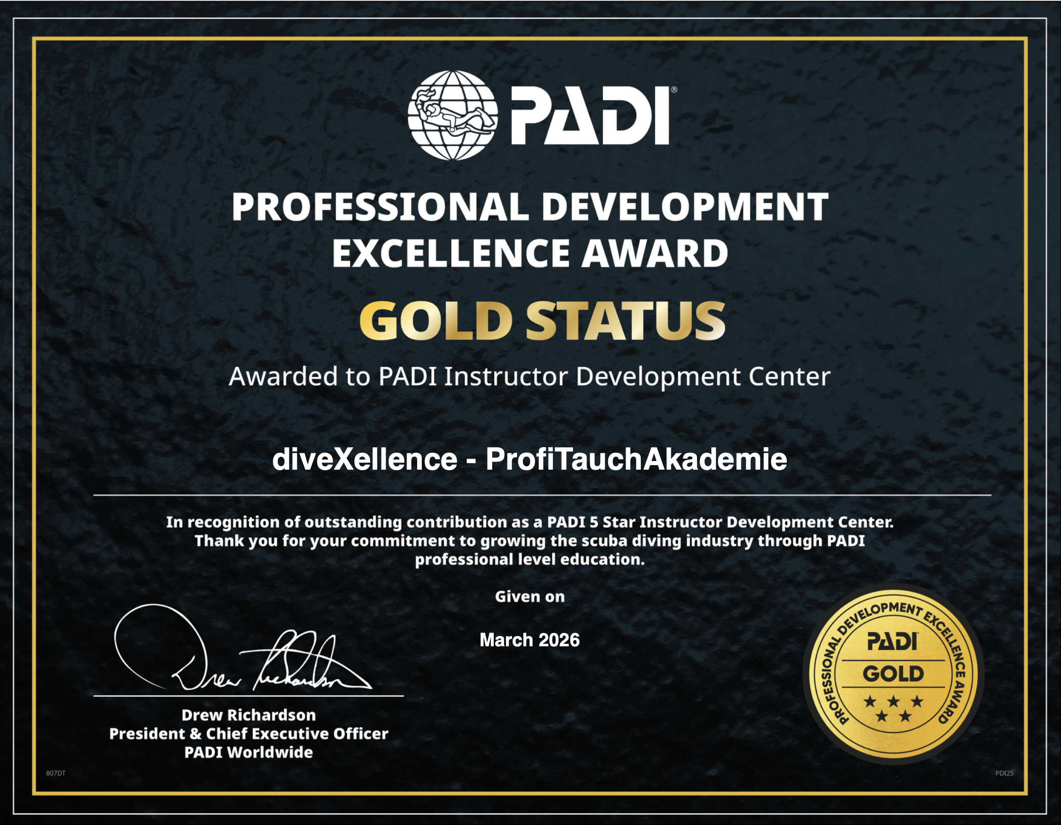 - diveXellence PADI Professional Development Excellence Award certificate showing Gold Status and recipient center name.